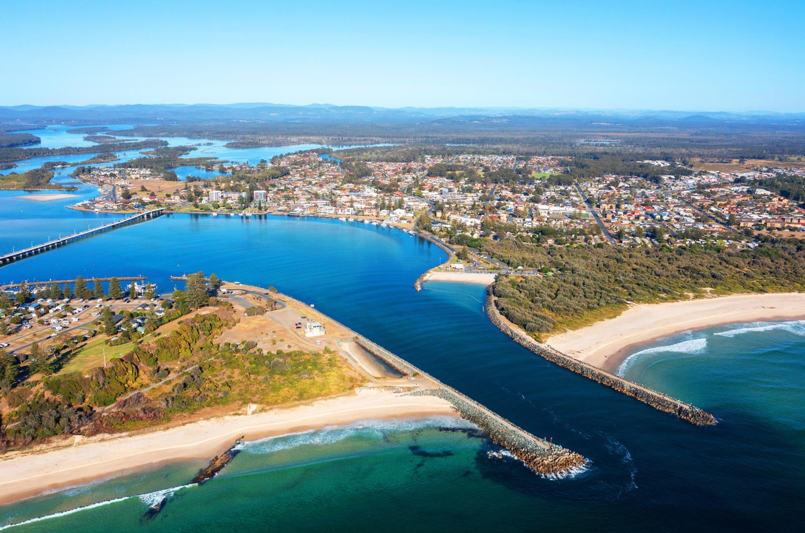 Aerial view of Forster's beaches and breakwall on the Mid North Coast